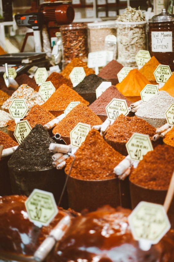 Vibrant spices neatly arranged in a market stall with visible pricing labels. Istanbul
