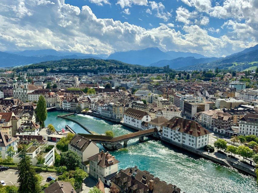a city with a river running through it Lucerne Switzerland