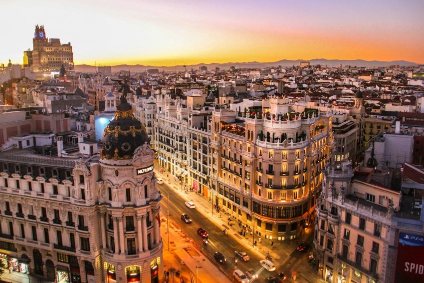 aerial photography of vehicles passing between high rise buildings, Barcelona, Spain