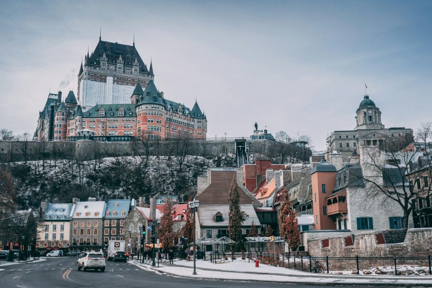 white and gray castle and buildings, Quebec City, Canada