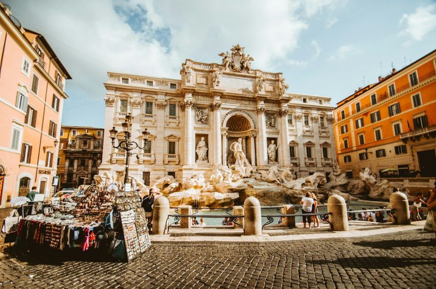 man standing in front of statue, Rome, Italy