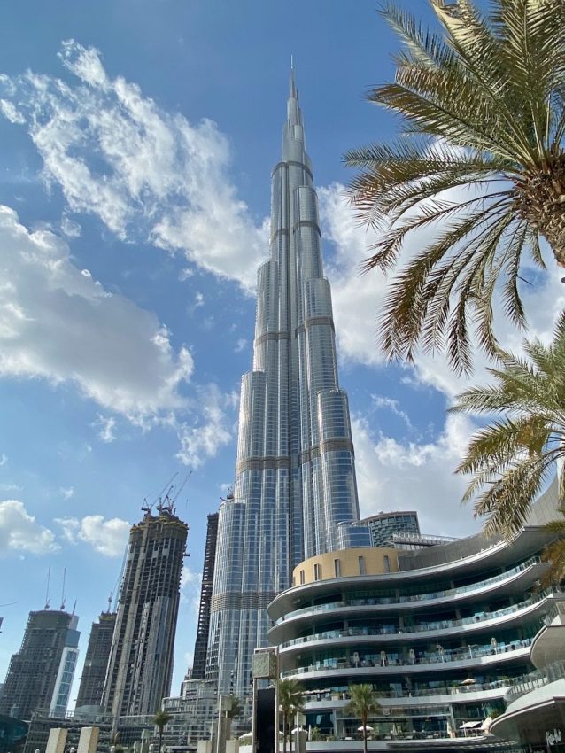 white high rise building under blue sky during daytime, dubai