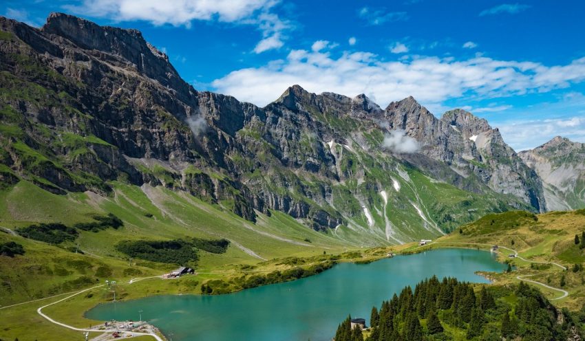 a lake in the middle of a mountain range, Trubsee, Titlis, Switzerland
