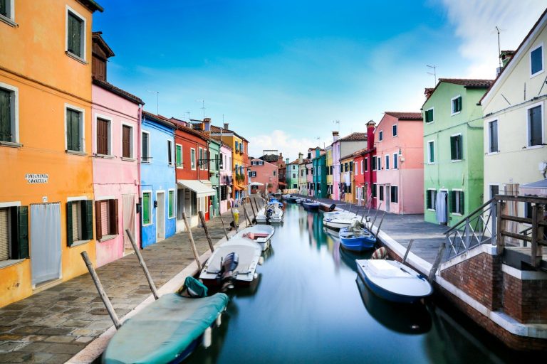 boats on canal between houses during daytime, Burano, Venice, Italy
