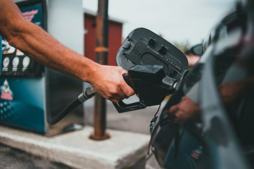 putting fuel into a car
